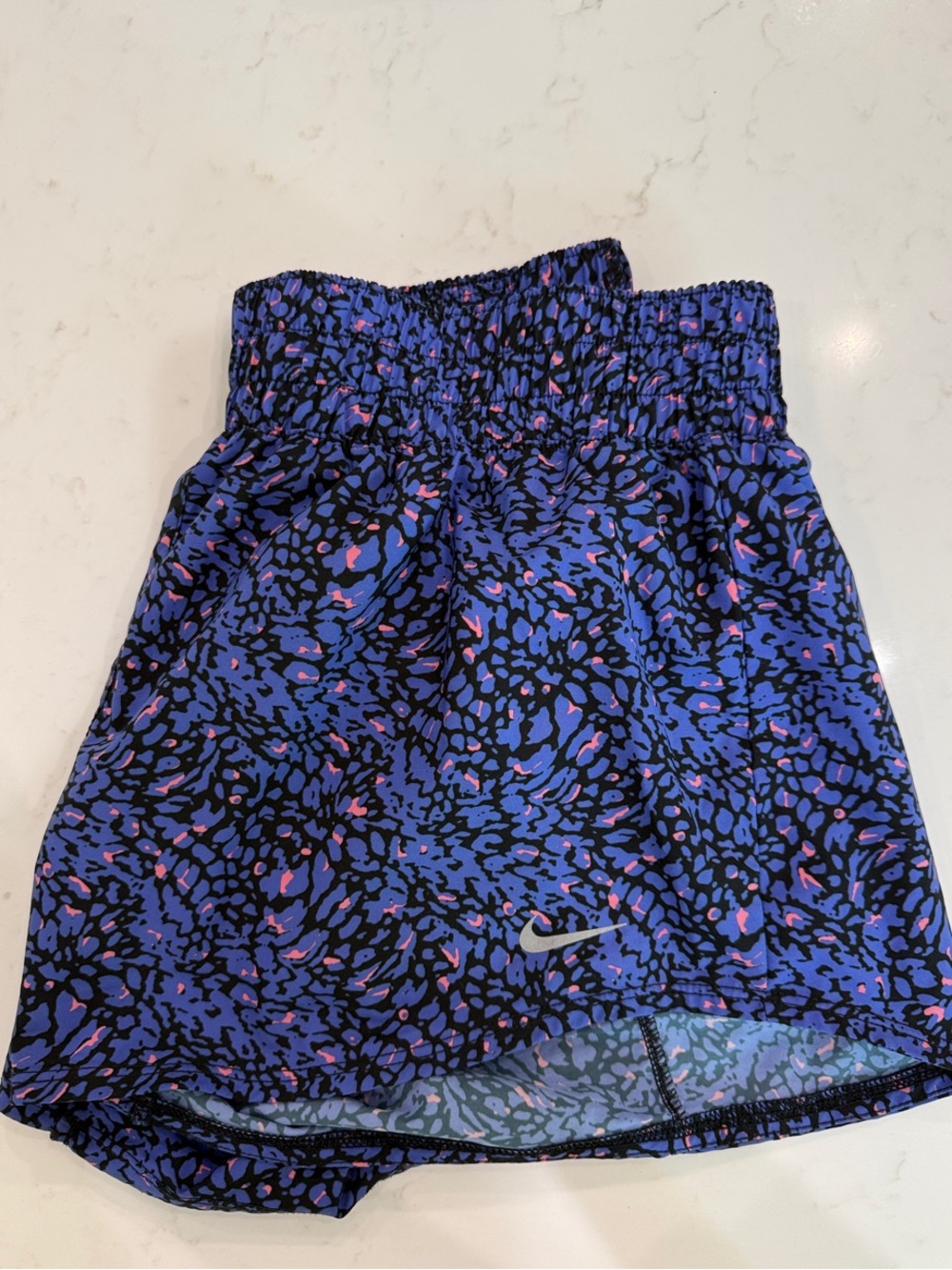 Nike Women's Blue, Black and Pink cheetah/leopard running shorts